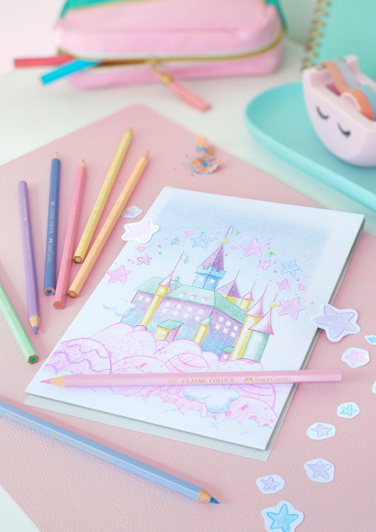 An image of 12 pastel metallic colour pencils by Faber Castell. There is a fantasy castle illustration to show them in use. 