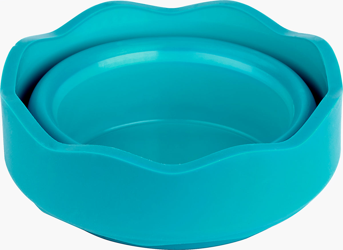 An image of a turquoise painting water cup folded flat.