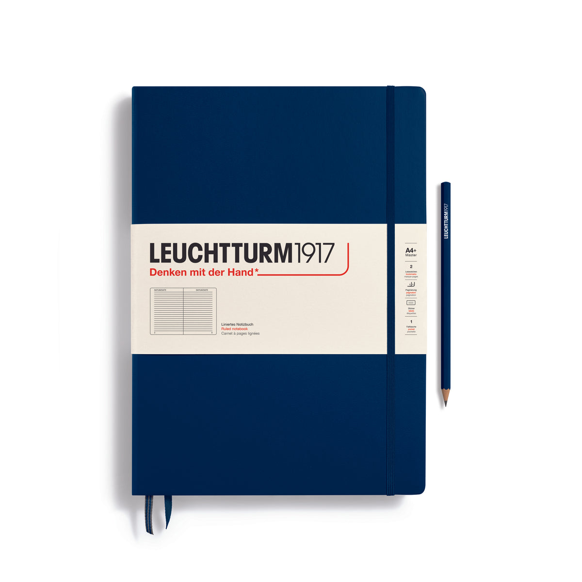 A large dark blue notebook with a white paper band around it with the logo of the brand Leuchtturm1917. Below this is an image of the page ruling inside - in this case, ruled or lined. It has two page marker ribbons showing at the bottom near the binding and a matching colour elastic notebook closure holding it neatly together. A dark blue Leuchtturm pencil is shown at the side of the book.