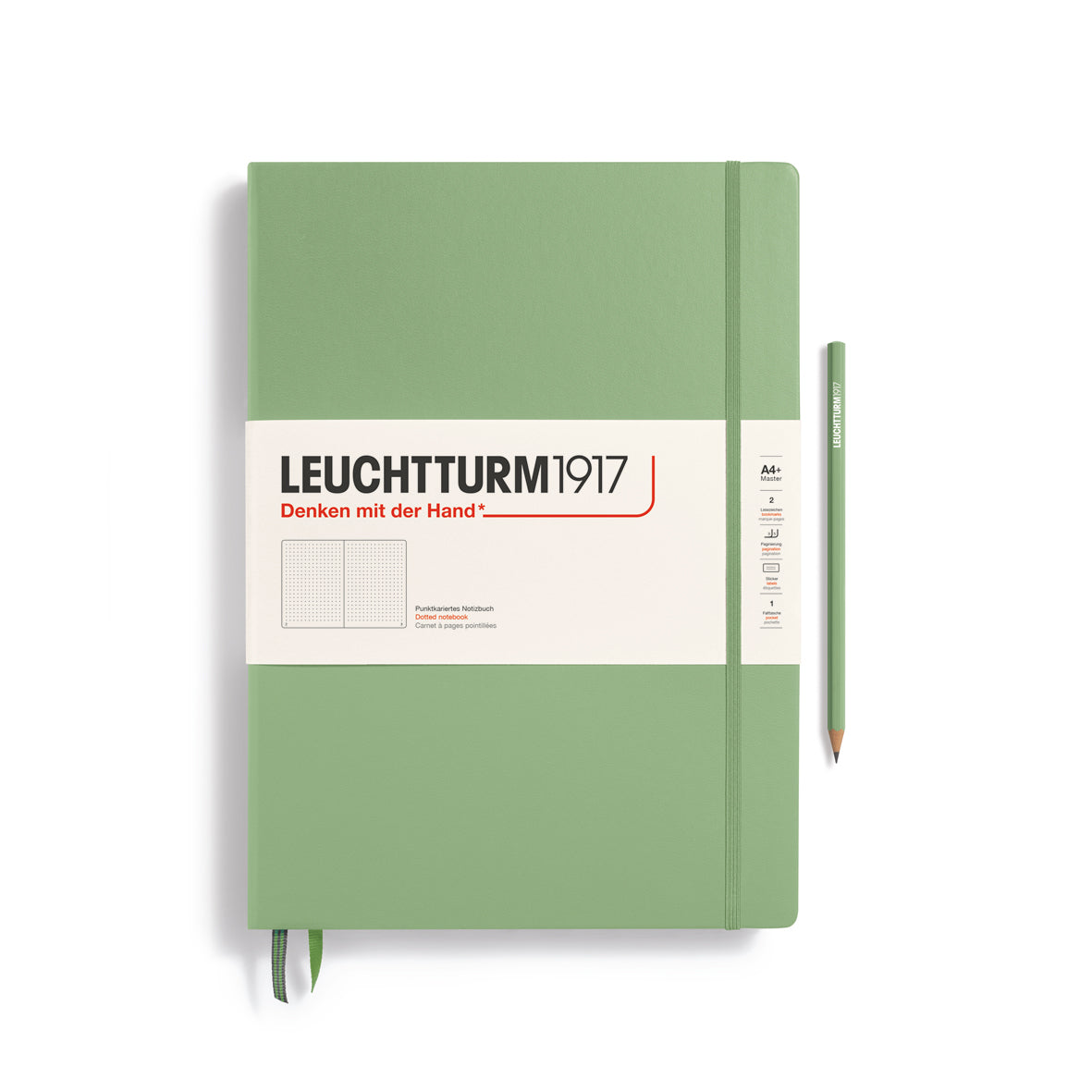 A large sage green notebook with a white paper band around it with the logo of the brand Leuchtturm1917. Below this is an image of the page ruling inside - in this case, dotted. It has two page marker ribbons showing at the bottom near the binding and a matching colour elastic notebook closure holding it neatly together. A sage green Leuchtturm pencil is shown at the side of the book.