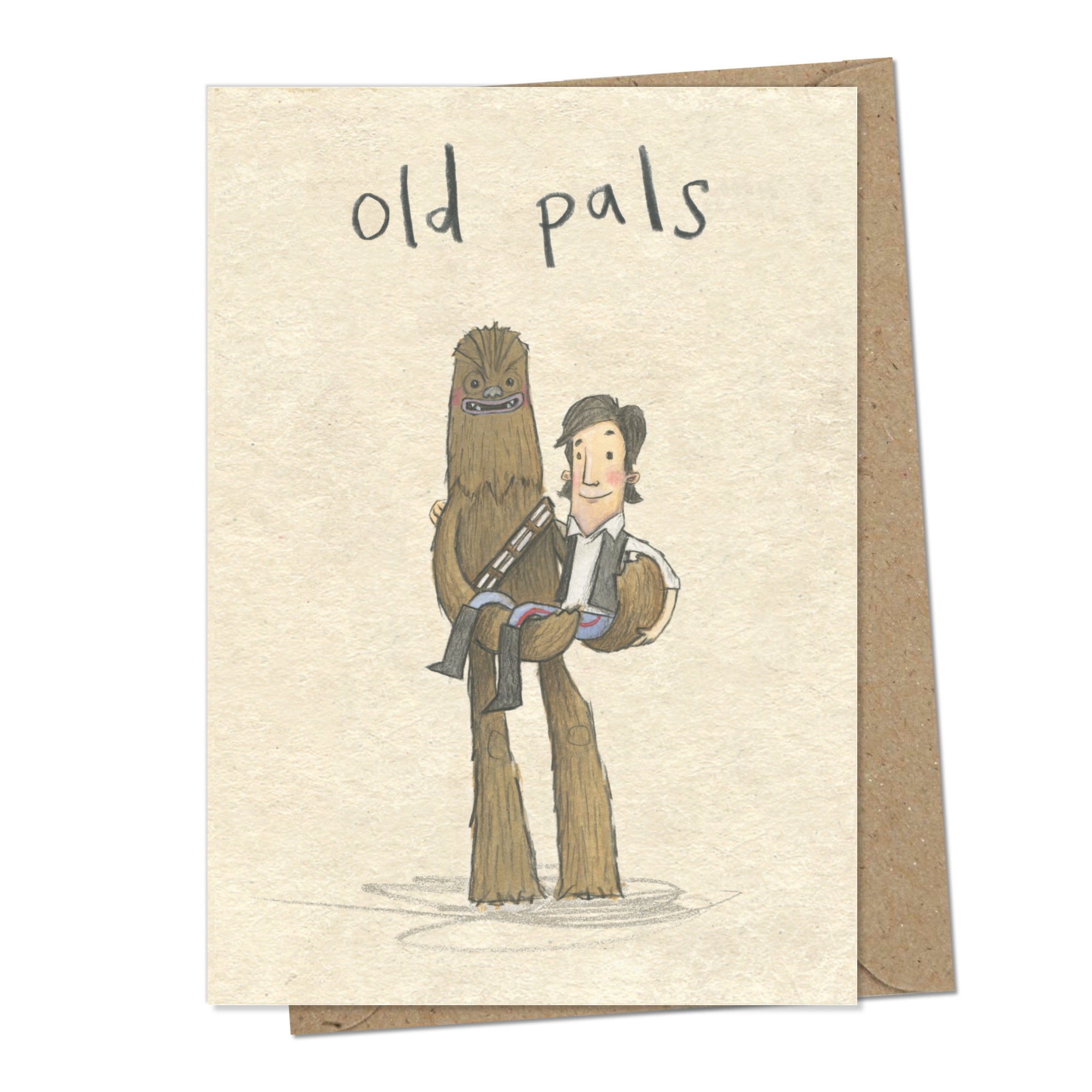 A greetings card with a mottled beige background and handwritten words above the illustration stating 'old pals'. The illustration is of characters from the movie star wars - Chewie carrying Han Solo and them both smiling.