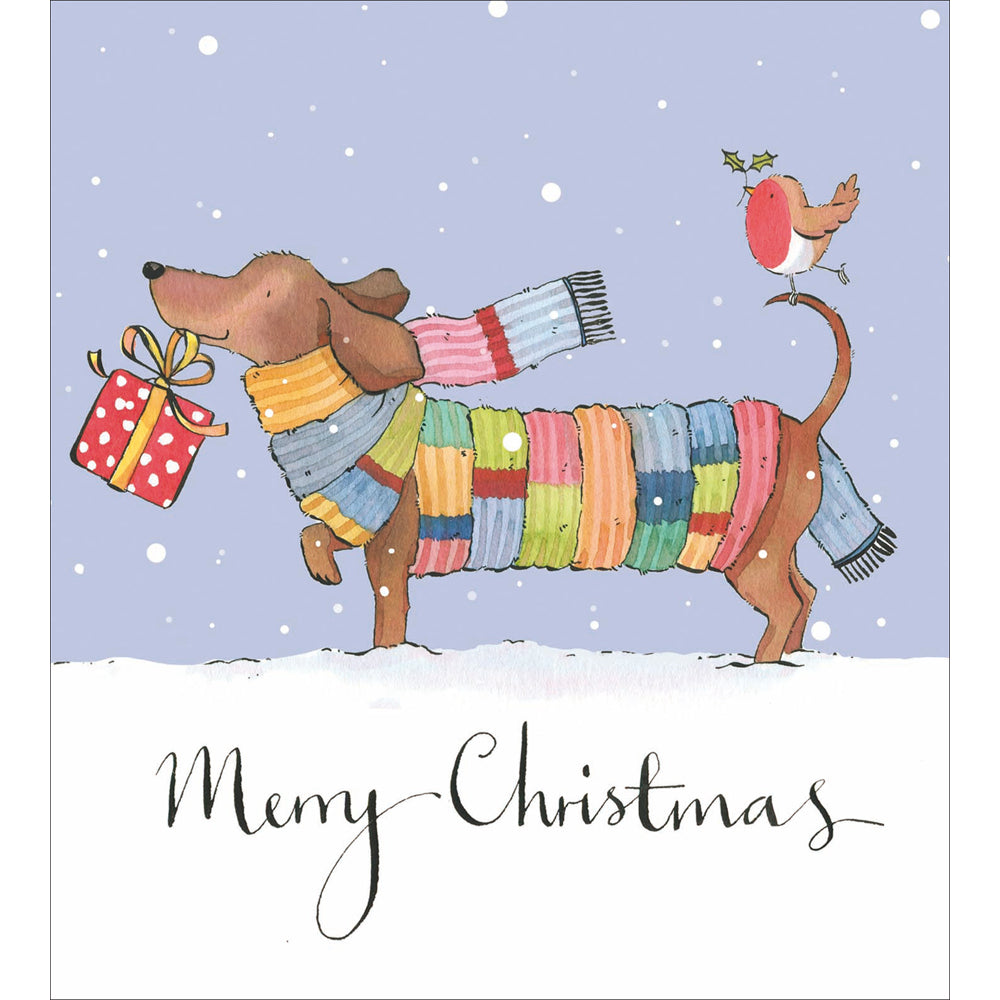 A christmas card with a sausage dog with a very long knitted scarf wrapped around him neck and tummy. 