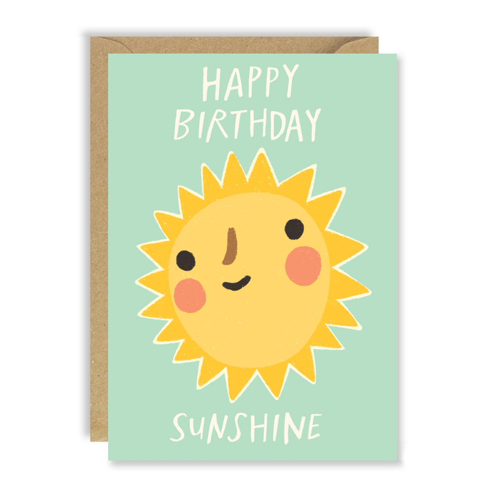 A mint green greetings card with a large illustrated sunshine with a smiley face. The words in white around the sun read 'happy birthday sunshine'.