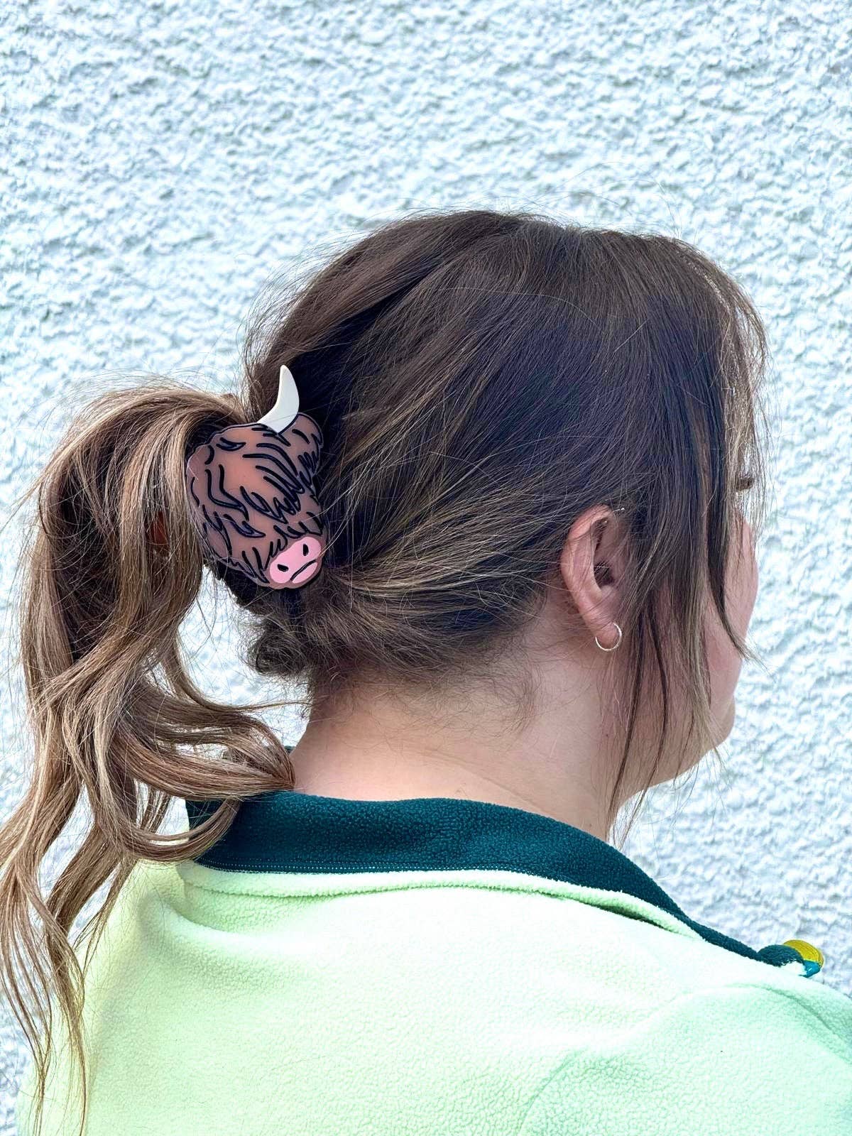 Highland Cow Hair Claw shown in hair