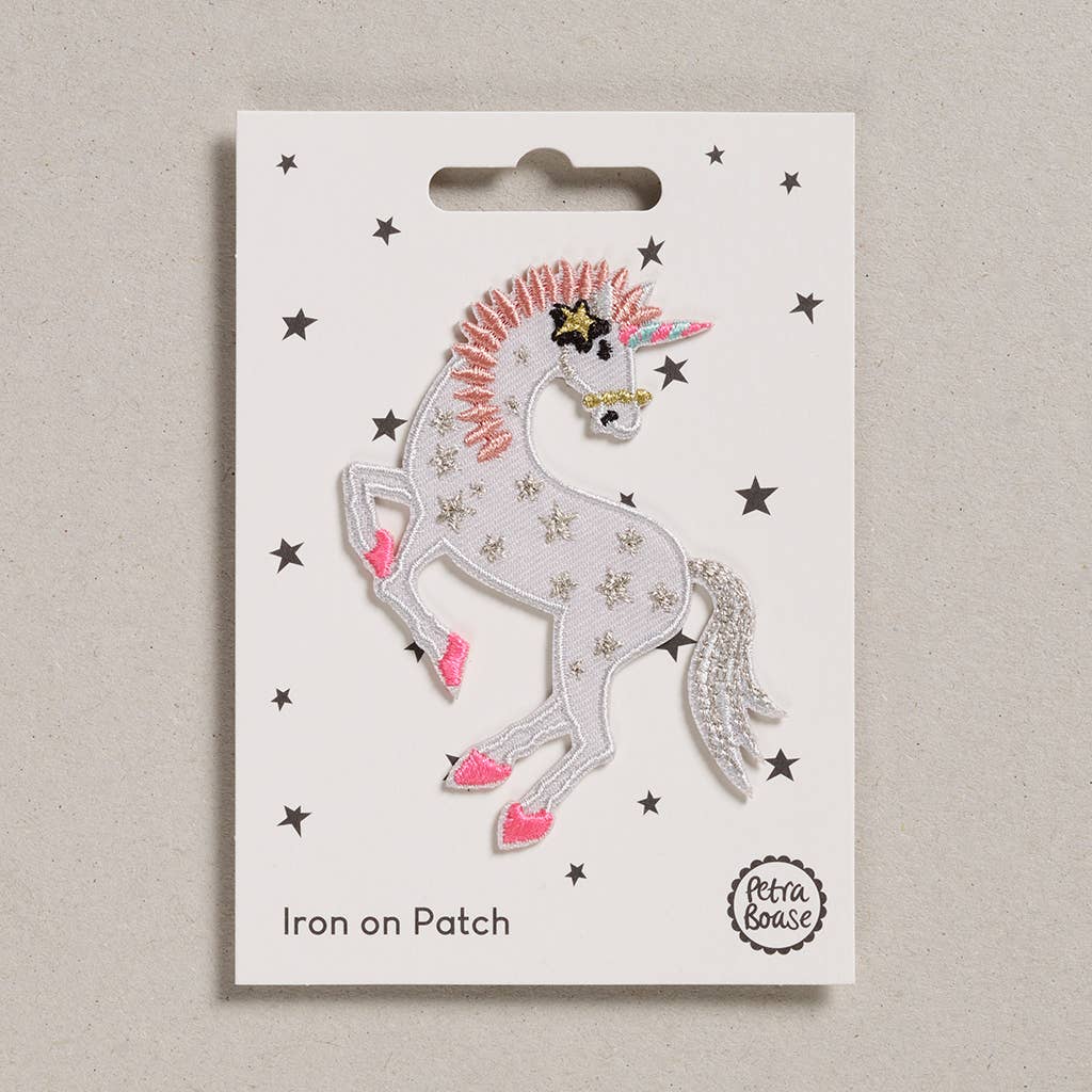 Colourful Iron on Patch - Unicorn on a packing card at penny black