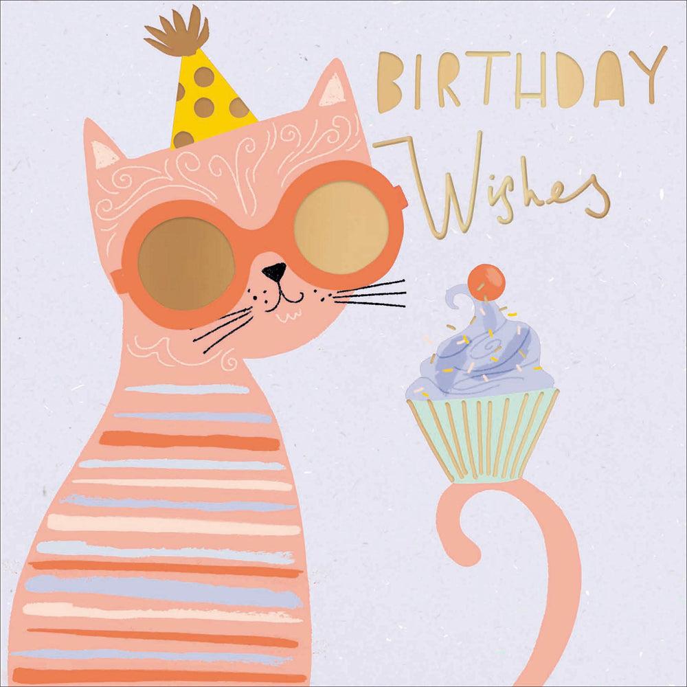 A greetings card with a lilac background and features a large peach coloured illustration of a cat with gold sunglasses on and balancing a cupcake on it&#39;s tail. The words &#39;Birthday Wishes&#39; are in gold foil.
