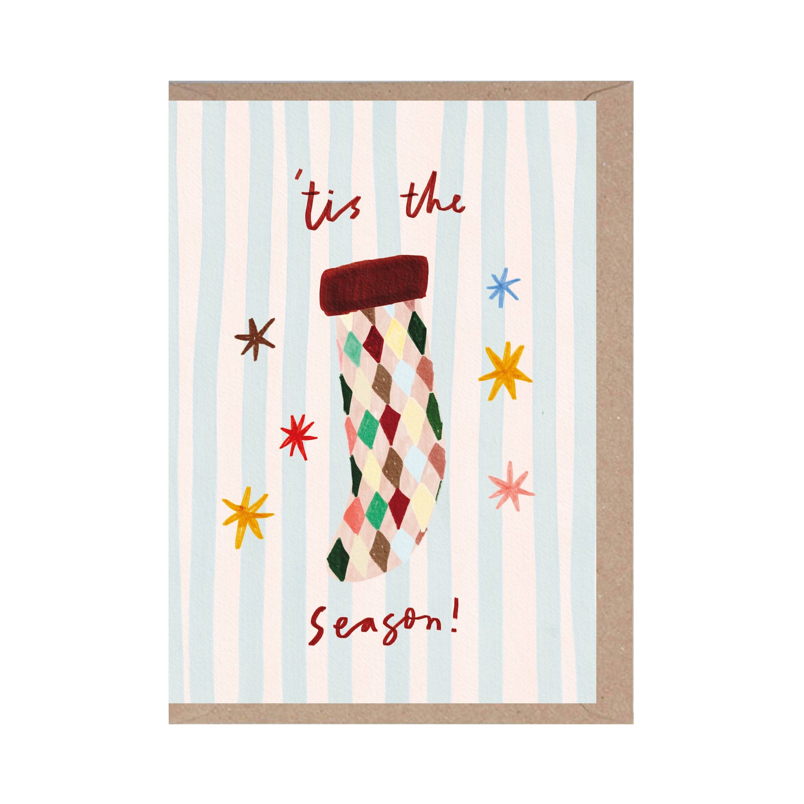 A Christmas greeting card with a kraft envelope, featuring a striped background and an illustration of a christmas stocking with the text 'tis the Season!'.