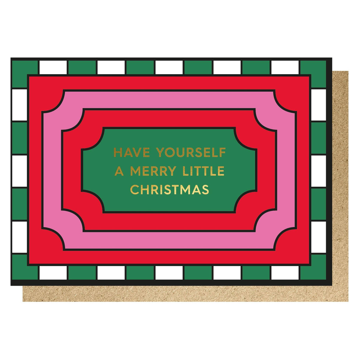 A Christmas greeting card with layered geometric borders in green, red, and pink, featuring the text 'HAVE YOURSELF A MERRY LITTLE CHRISTMAS' in gold lettering on a green centre panel. The card is shown with a kraft paper envelope behind it on a white background.