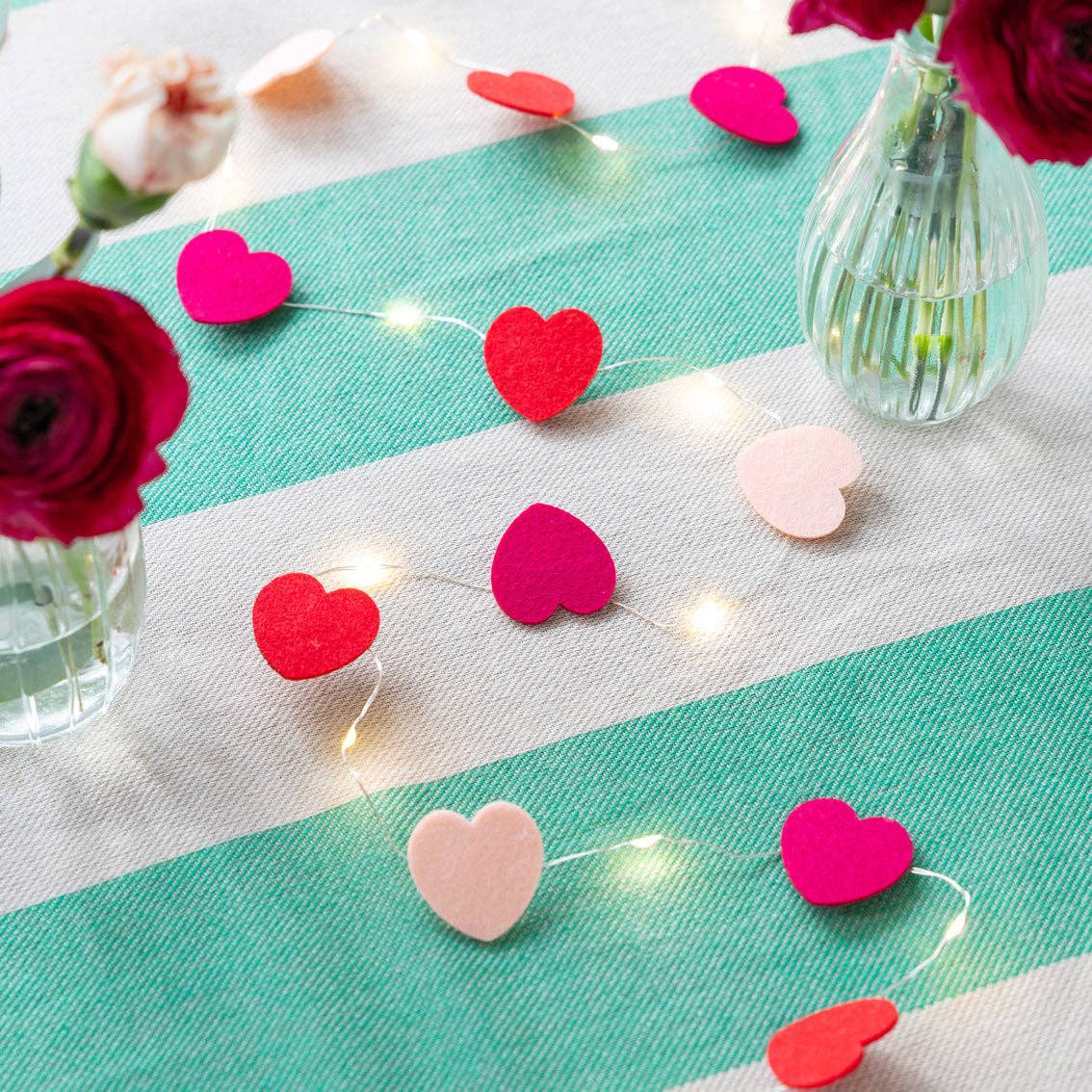 Love Icons Felt Heart String Lights 2m - shown on a table top from penny black