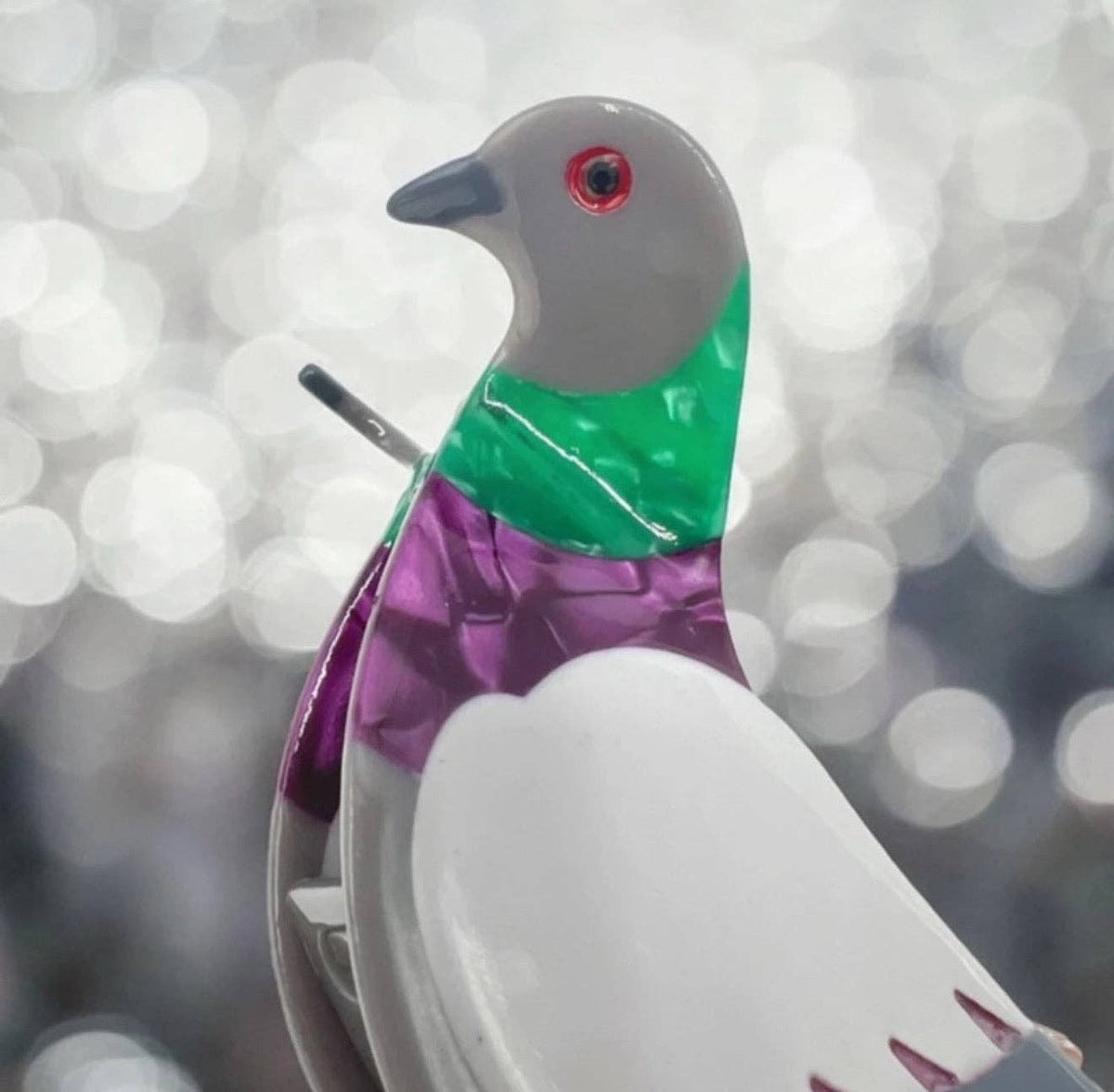 Pigeon Hair Claw by penny black close up of head