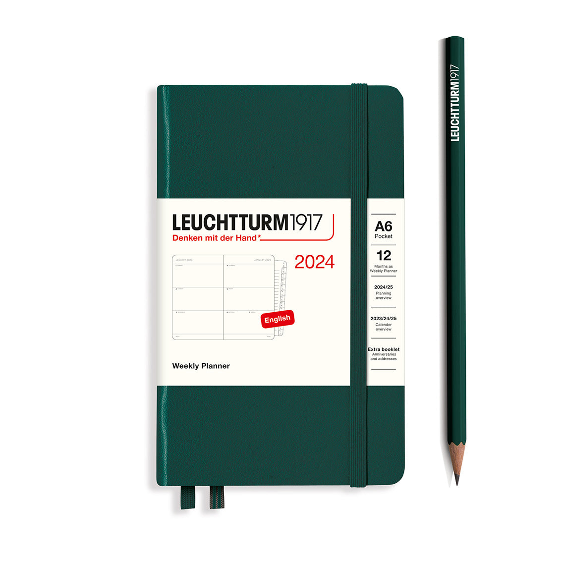 An image of a dark green planner with a dark green elastic band holding it together and a cream paper wrap around the middle stating the business name Leuchtturm1917, that it is for the year 2024, it is a weekly planner, is A6 in size and an English language version. It has an image on the wrap showing the inside layout which is a week spread across 2 pages. A dark green pencil is shown at the side of the planner.