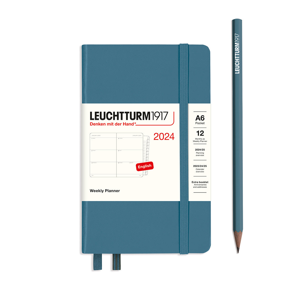 An image of a blue planner with a blue elastic band holding it together and a cream paper wrap around the middle stating the business name Leuchtturm1917, that it is for the year 2024, it is a weekly planner, is A6 in size and an English language version. It has an image on the wrap showing the inside layout which is a week spread across 2 pages. A blue pencil is shown at the side of the planner.