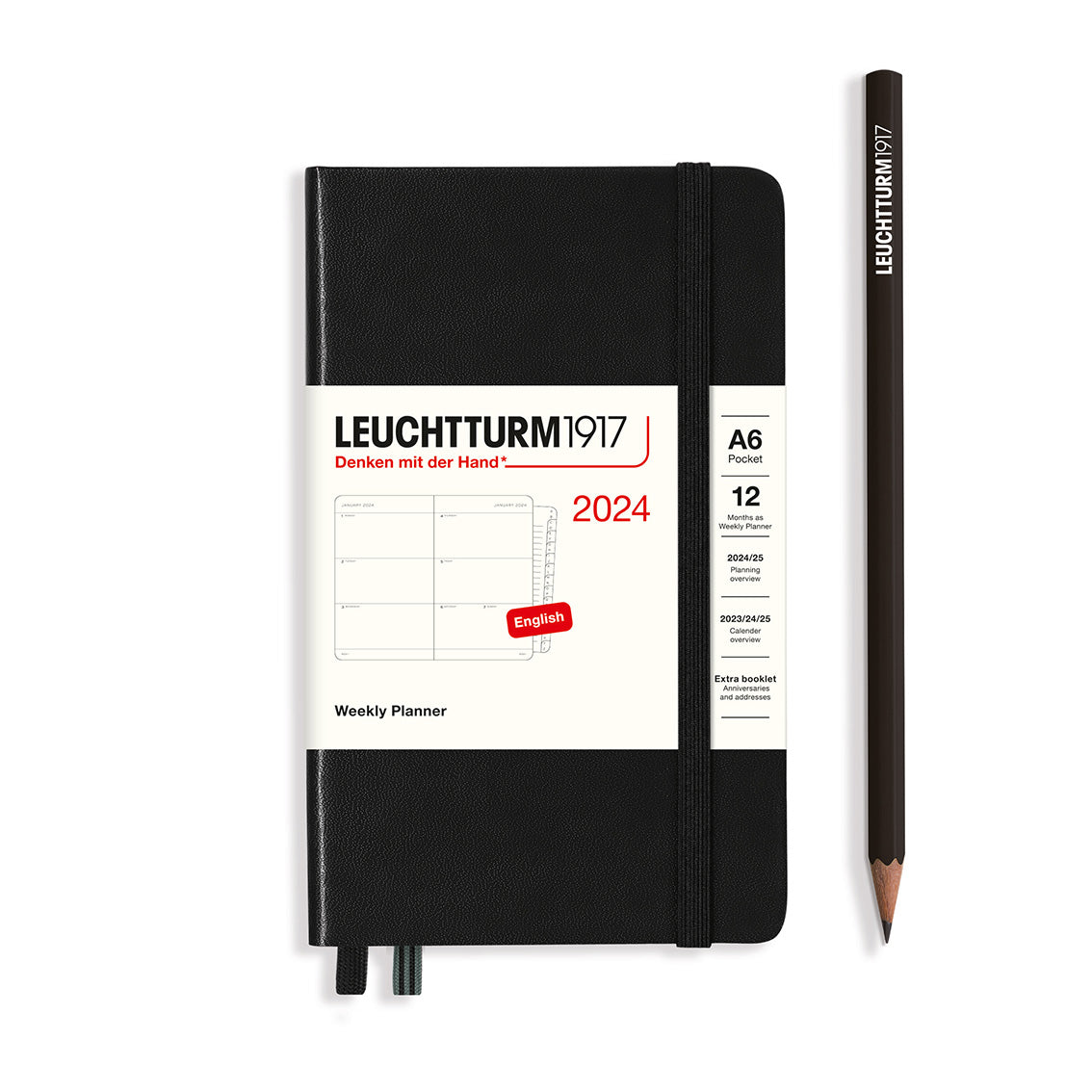 An image of a black planner with a black elastic band holding it together and a cream paper wrap around the middle stating the business name Leuchtturm1917, that it is for the year 2024, it is a weekly planner, is A6 in size and an English language version. It has an image on the wrap showing the inside layout which is a week spread across 2 pages. A black pencil is shown at the side of the planner.