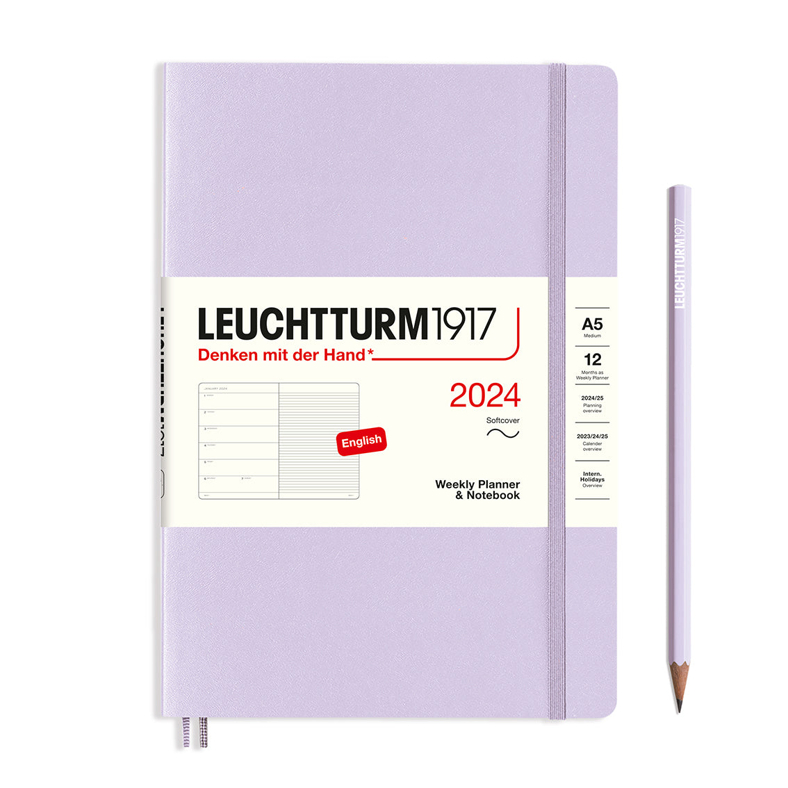 An image of a lilac planner with a lilac elastic band holding it together and a cream paper wrap around the middle stating the business name Leuchtturm1917, that it is for the year 2024, it is a weekly planner and notebook, is A5 in size and an English language version. It has an image on the wrap showing the inside layout which is a week on the left hand page and a notes page on thr right hand page. A lilac pencil is shown at the side of the planner.