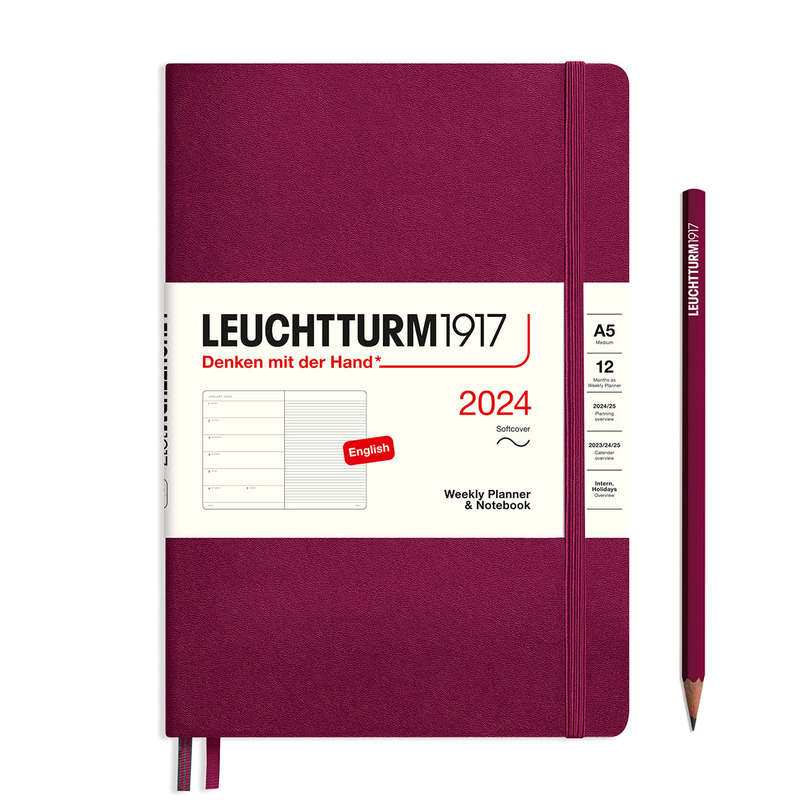 An image of a burgundy planner with a burgundy elastic band holding it together and a cream paper wrap around the middle stating the business name Leuchtturm1917, that it is for the year 2024, it is a weekly planner and notebook, is A5 in size and an English language version. It has an image on the wrap showing the inside layout which is a week on the left hand page and a notes page on thr right hand page. A burgundy pencil is shown at the side of the planner.