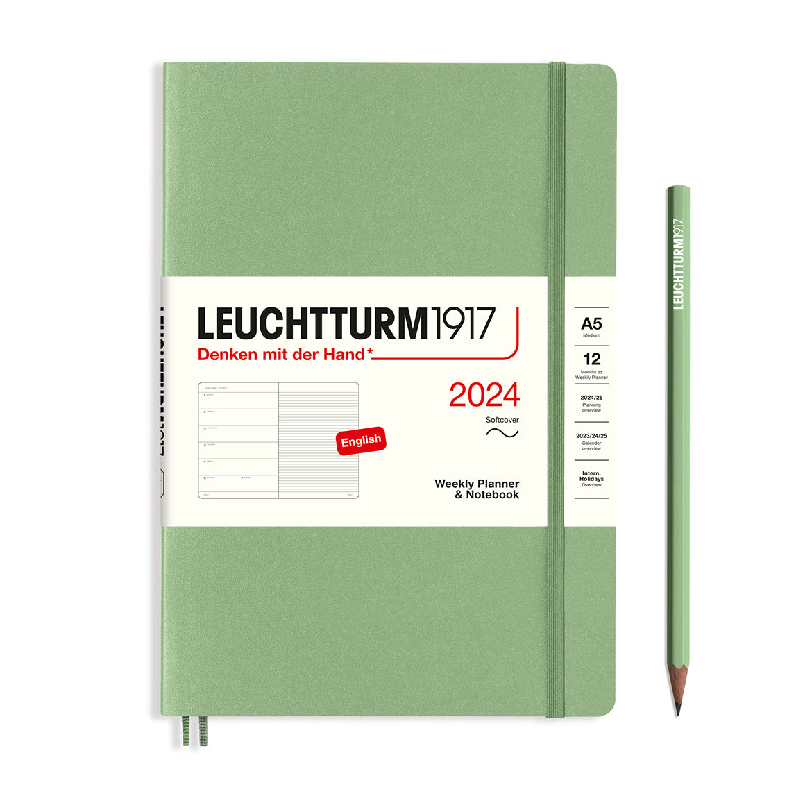 An image of a sage green planner with a sage green elastic band holding it together and a cream paper wrap around the middle stating the business name Leuchtturm1917, that it is for the year 2024, it is a weekly planner and notebook, is A5 in size and an English language version. It has an image on the wrap showing the inside layout which is a week on the left hand page and a notes page on thr right hand page. A sage green pencil is shown at the side of the planner.