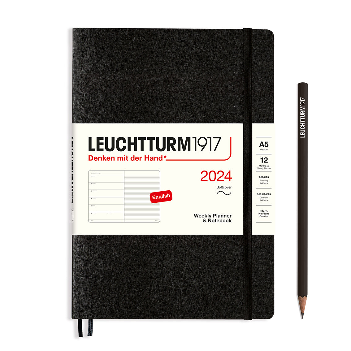 An image of a black planner with a black elastic band holding it together and a cream paper wrap around the middle stating the business name Leuchtturm1917, that it is for the year 2024, it is a weekly planner and notebook, is A5 in size and an English language version. It has an image on the wrap showing the inside layout which is a week on the left hand page and a notes page on thr right hand page. A black pencil is shown at the side of the planner.