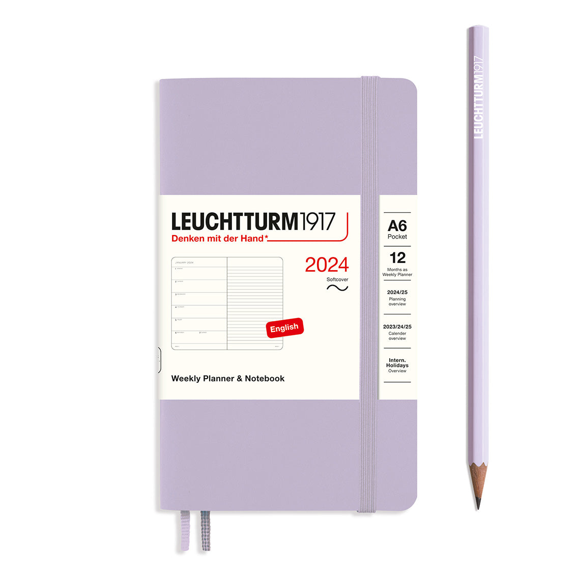 An image of a lilac planner with a lilac elastic band holding it together and a cream paper wrap around the middle stating the business name Leuchtturm1917, that it is for the year 2024, it is a weekly planner and notebook, is A6 in size and an English language version. It has an image on the wrap showing the inside layout which is a week on the left hand page and a notes page on thr right hand page. A lilac pencil is shown at the side of the planner.