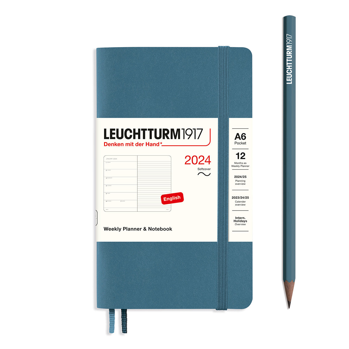 An image of a blue planner with a blue elastic band holding it together and a cream paper wrap around the middle stating the business name Leuchtturm1917, that it is for the year 2024, it is a weekly planner and notebook, is A6 in size and an English language version. It has an image on the wrap showing the inside layout which is a week on the left hand page and a notes page on thr right hand page. A blue pencil is shown at the side of the planner.