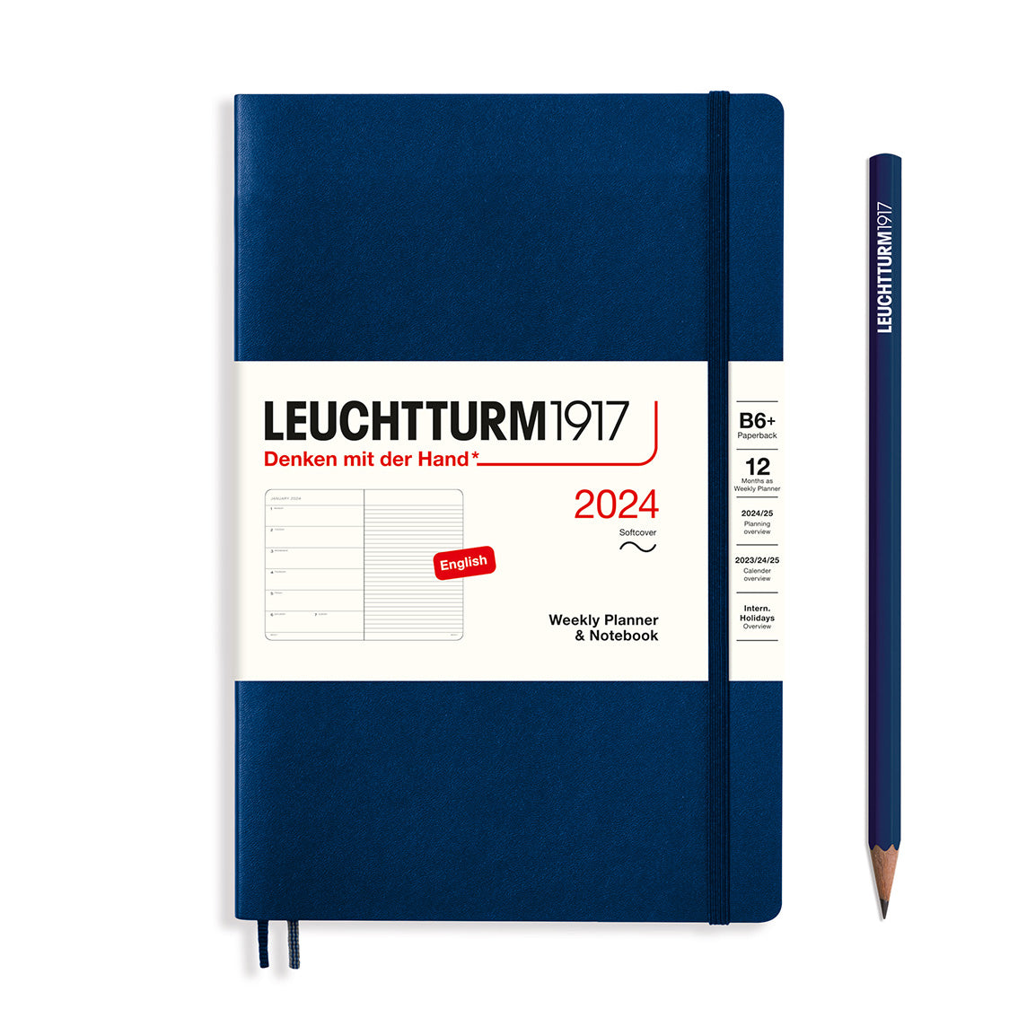 An image of a navy planner with a navy elastic band holding it together and a cream paper wrap around the middle stating the business name Leuchtturm1917, that it is for the year 2024, it is a weekly planner and notebook, is B6+ in size and an English language version. It has an image on the wrap showing the inside layout which is a week on the left hand page and a notes page on thr right hand page. A navy pencil is shown at the side of the planner.