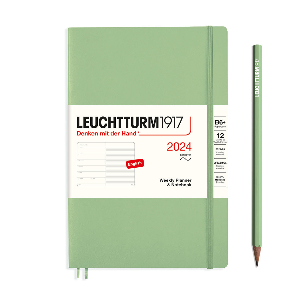 An image of a sage green planner with a sage green elastic band holding it together and a cream paper wrap around the middle stating the business name Leuchtturm1917, that it is for the year 2024, it is a weekly planner and notebook, is B6+ in size and an English language version. It has an image on the wrap showing the inside layout which is a week on the left hand page and a notes page on thr right hand page. A sage green pencil is shown at the side of the planner.