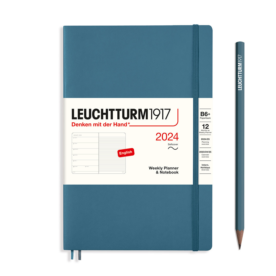 An image of a blue planner with a blue elastic band holding it together and a cream paper wrap around the middle stating the business name Leuchtturm1917, that it is for the year 2024, it is a weekly planner and notebook, is B6+ in size and an English language version. It has an image on the wrap showing the inside layout which is a week on the left hand page and a notes page on thr right hand page. A blue pencil is shown at the side of the planner.