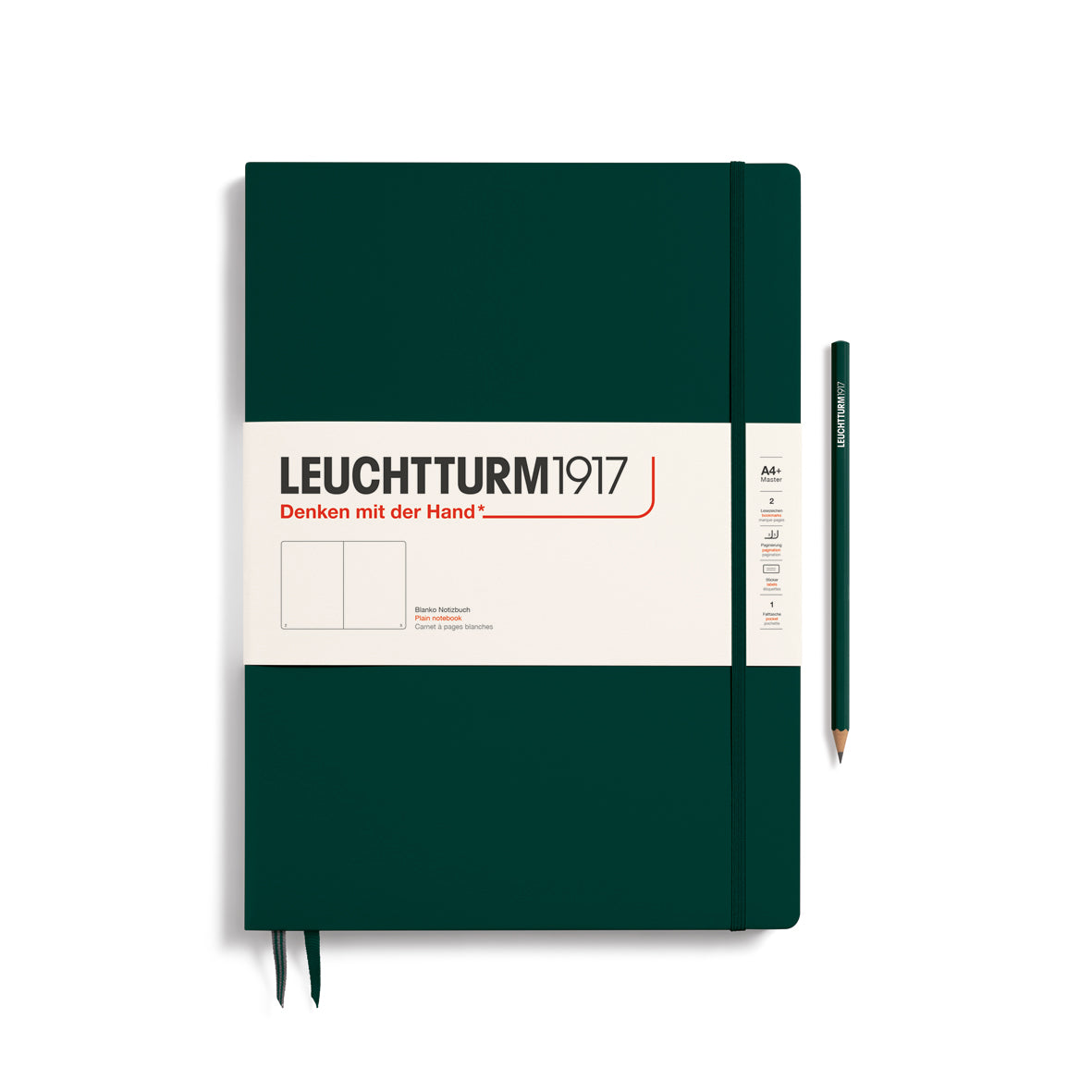 A large forest green colour notebook with a white paper band around it with the logo of the brand Leuchtturm1917. Below this is an image of the page ruling inside - in this case, plain. It has two page marker ribbons showing at the bottom near the binding and a matching colour elastic notebook closure holding it neatly together. A forest green colour LEUCHTTURM1917 pencil is shown at the side of the book for size reference.