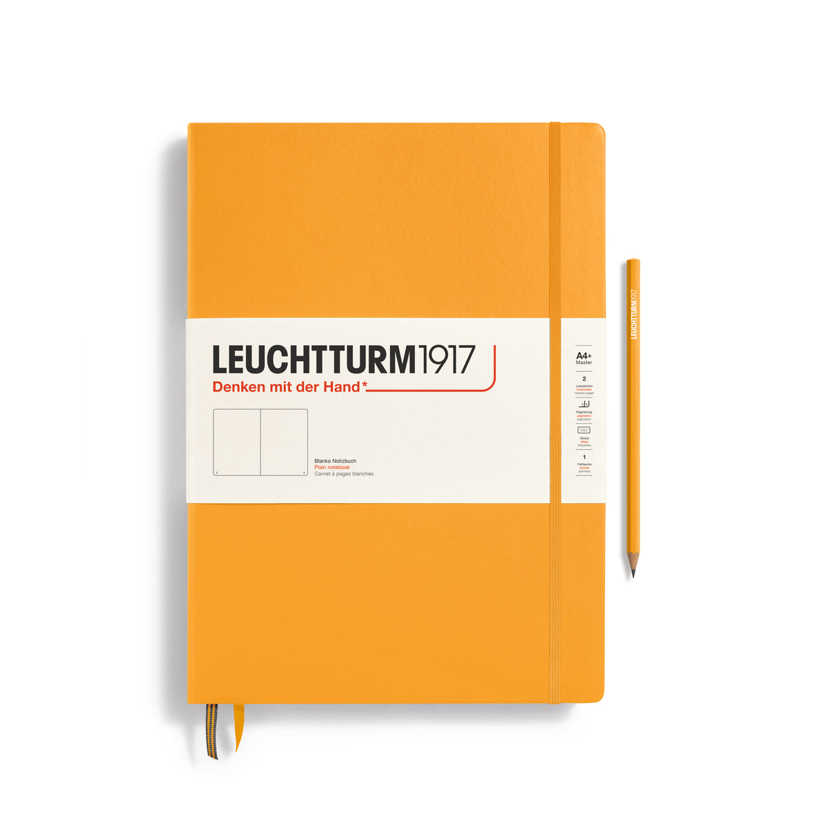A large rising sun colour notebook with a white paper band around it with the logo of the brand Leuchtturm1917. Below this is an image of the page ruling inside - in this case, plain. It has two page marker ribbons showing at the bottom near the binding and an elastic notebook closure holding it neatly together. A rising sun colour Leuchtturm pencil is shown at the side of the book.