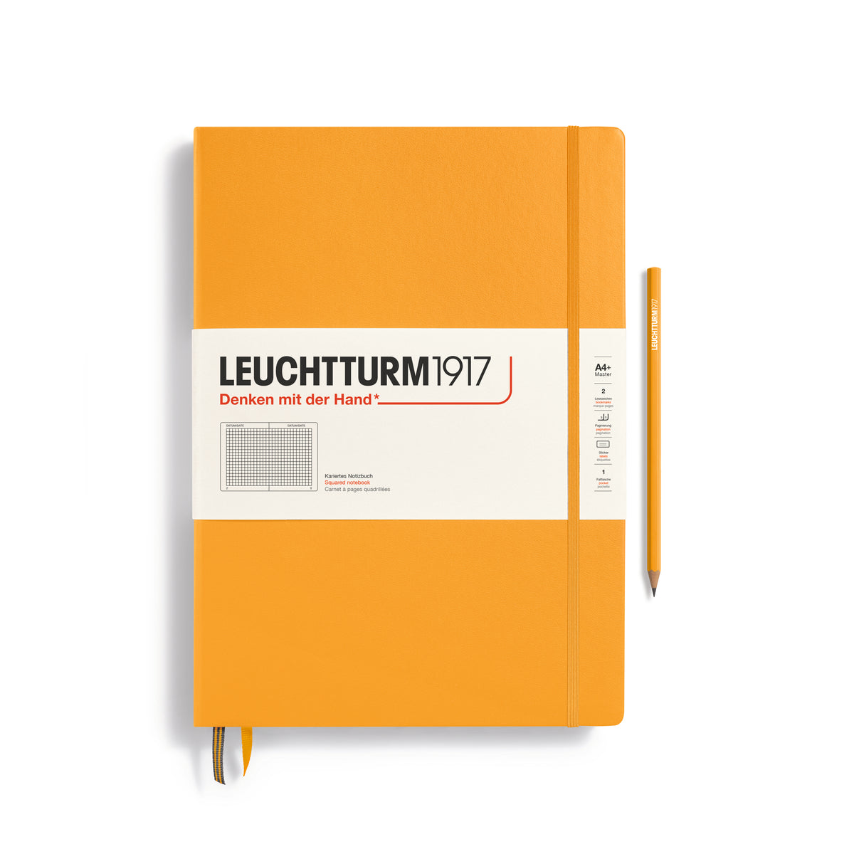 A large rising sun colour notebook with a white paper band around it with the logo of the brand Leuchtturm1917. Below this is an image of the page ruling inside - in this case, squared. It has two page marker ribbons showing at the bottom near the binding and an elastic notebook closure holding it neatly together. A rising sun colour Leuchtturm pencil is shown at the side of the book.