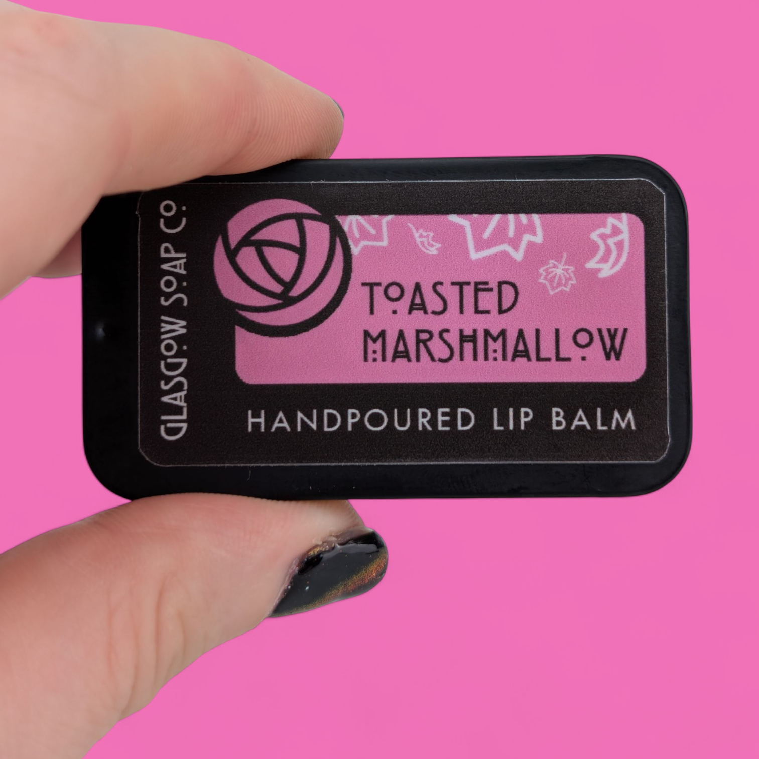 Toasted Marshmallow Lip Balm Tin by glasgow soap company at penny black - showing fingers holding tin
