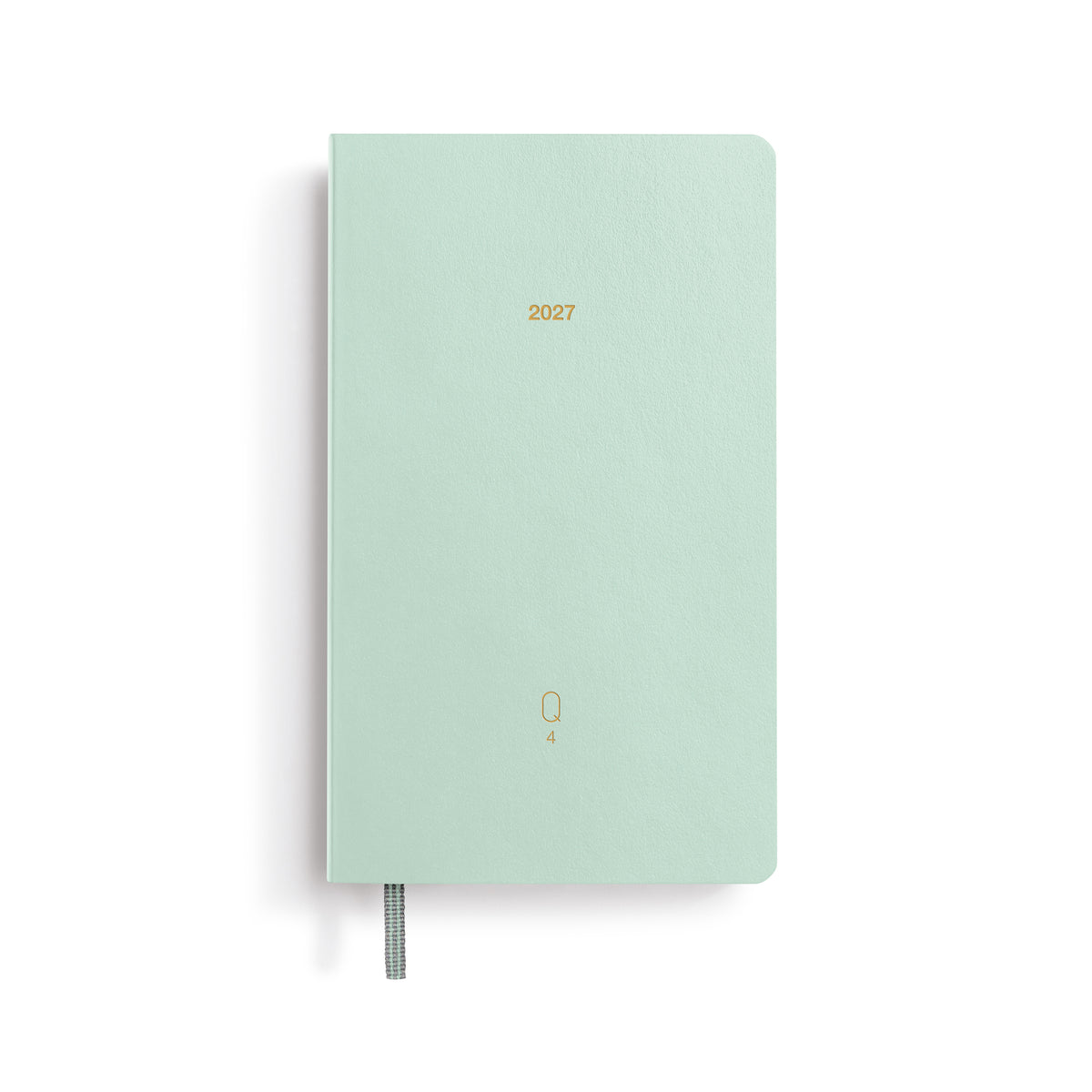 Mint green notebook with '2027' printed on a white background