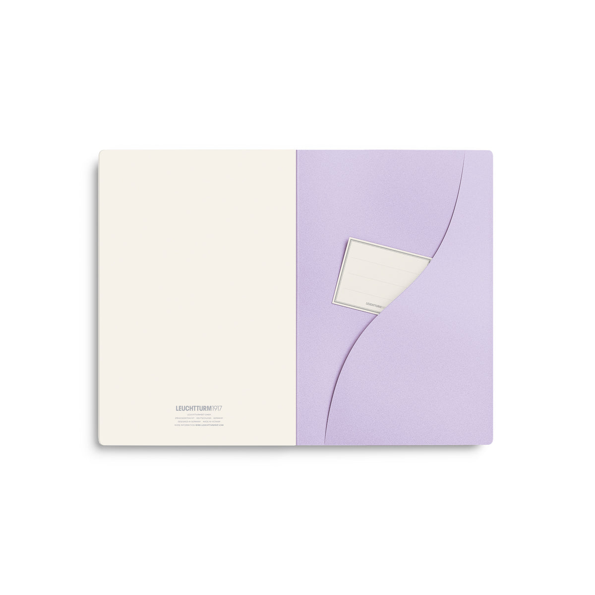 A Leuchtturm1917 A5 notebook in lilac cover and plain pages, showing the back pocket and archive label. on a clean white background.
