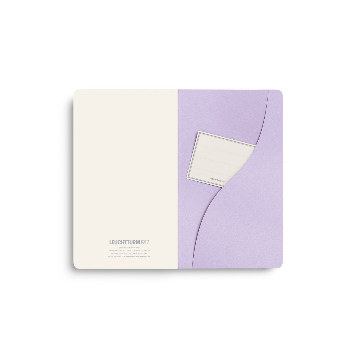 A Leuchtturm1917 notebook in lilac cover and plain pages, showing the back pocket and archive label. on a clean white background.