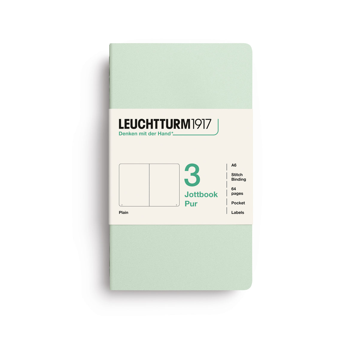 A Leuchtturm1917 3 pack of notebooks with mint green cover and plain pages, shown with a bellyband with product details, on a clean white background.