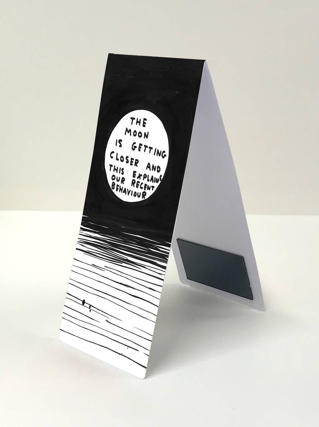 The Moon David Shrigley Magnetic Bookmark by penny black showing magnetic strip