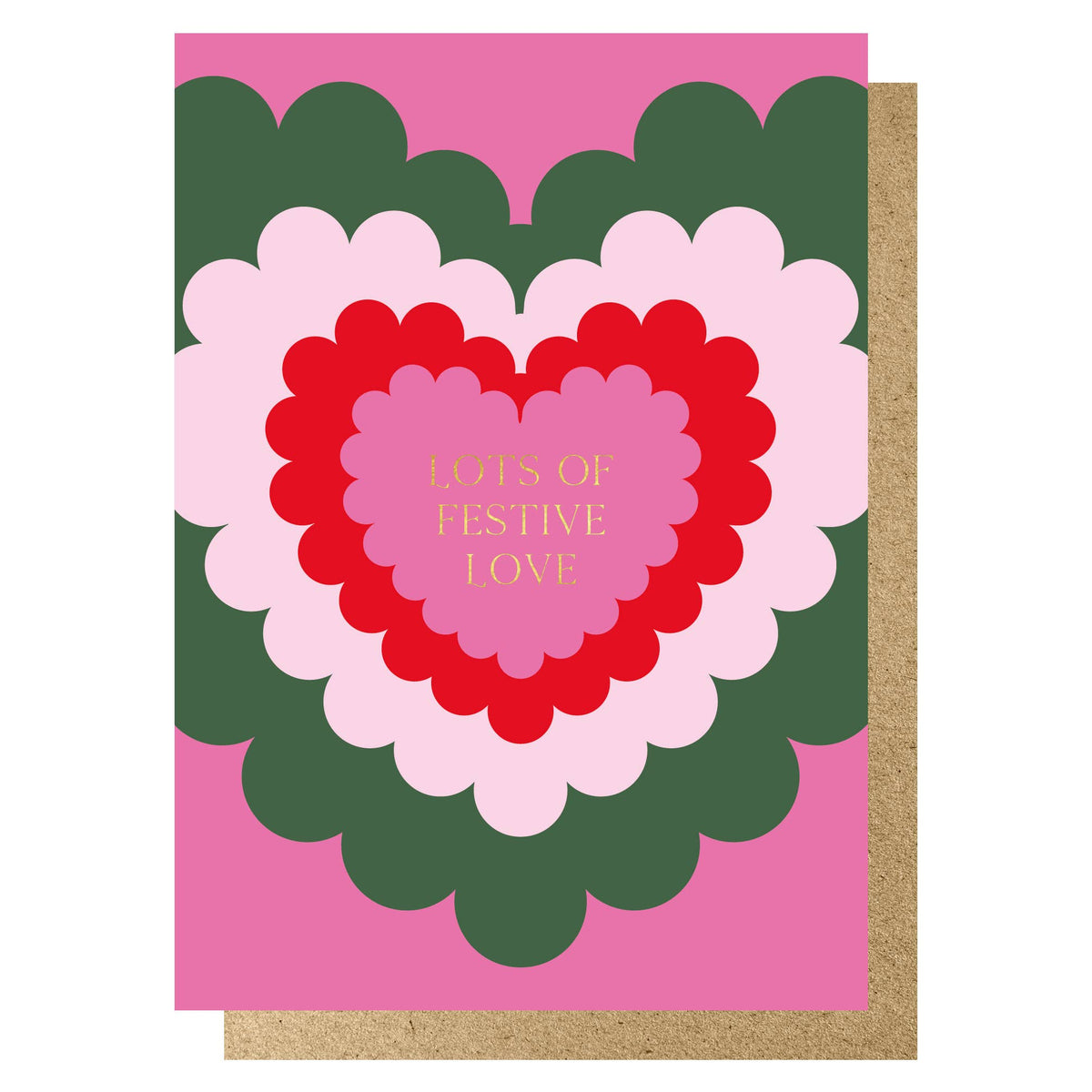 A Christmas greeting card with a layered heart design in pink, red, and light pink, surrounded by dark green and light pink scalloped shapes on a pink background. Gold text in the centre reads 'LOTS OF FESTIVE LOVE.