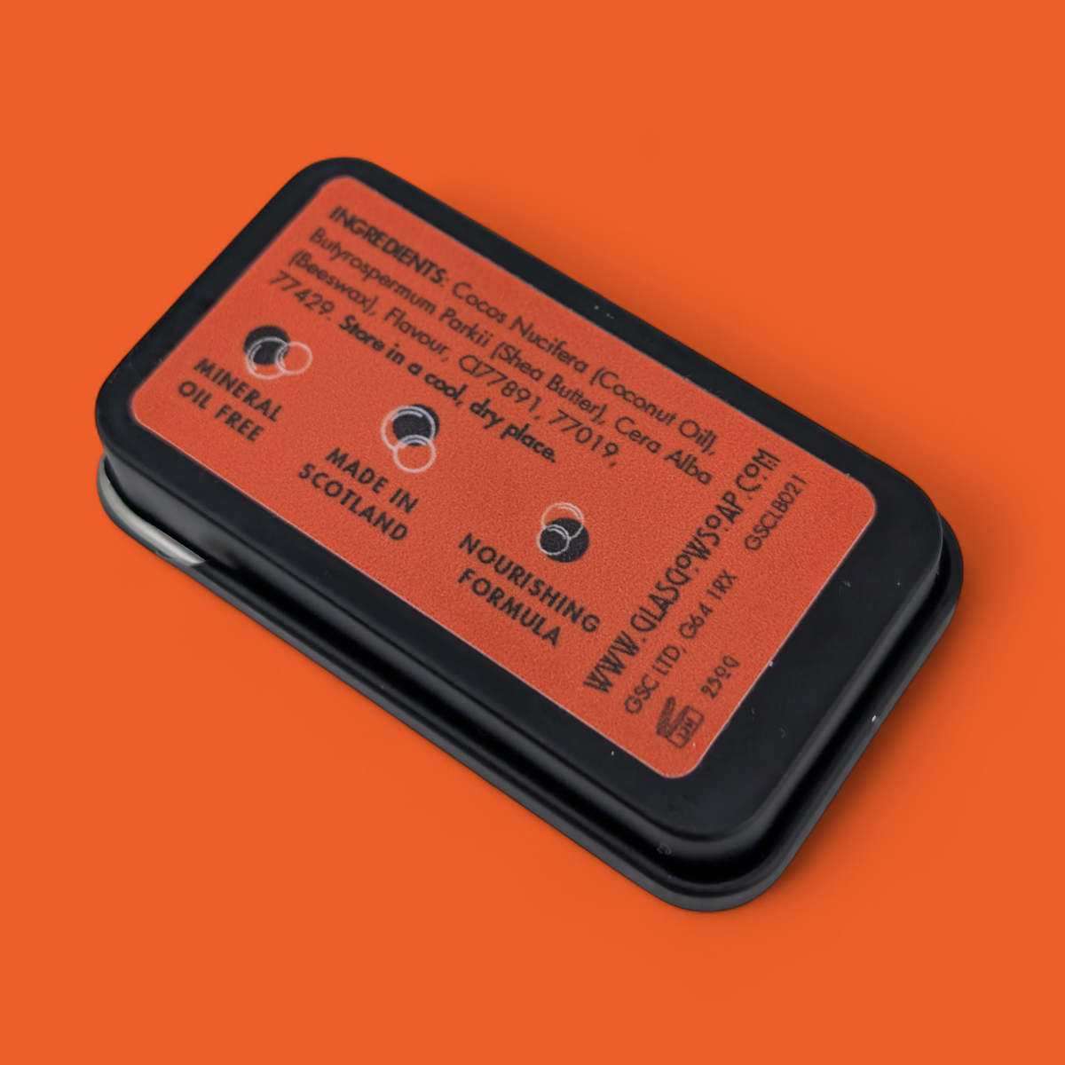 Pumpkin Spice Lip Balm Tin by glasgow soap company at penny black showing back of tin