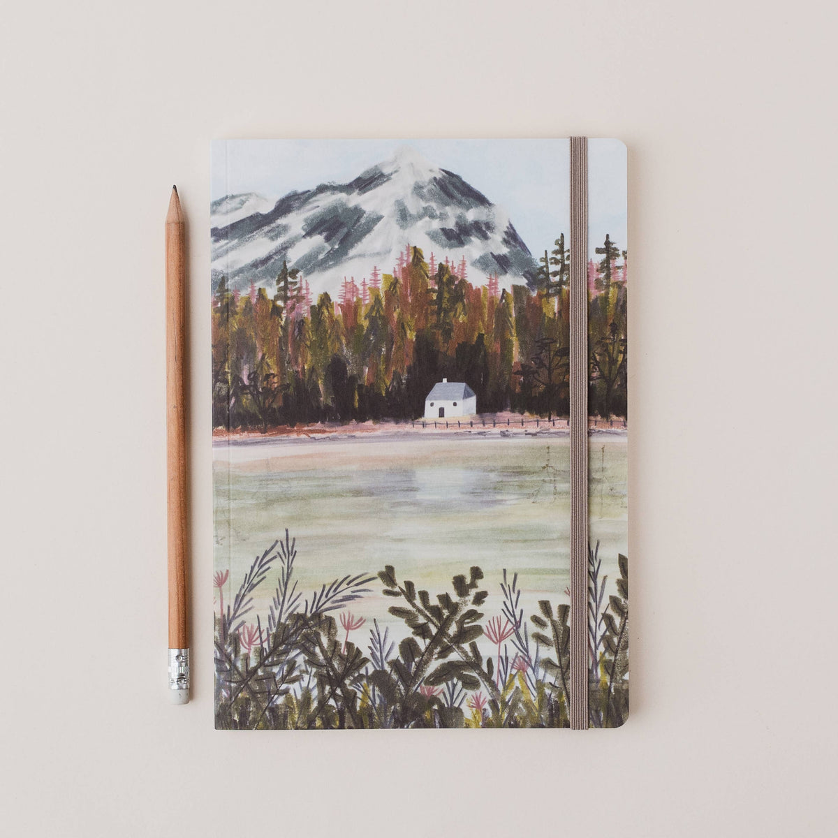 Loch Lomond A5 Scottish Ruled Notebook by penny black shown with pencil