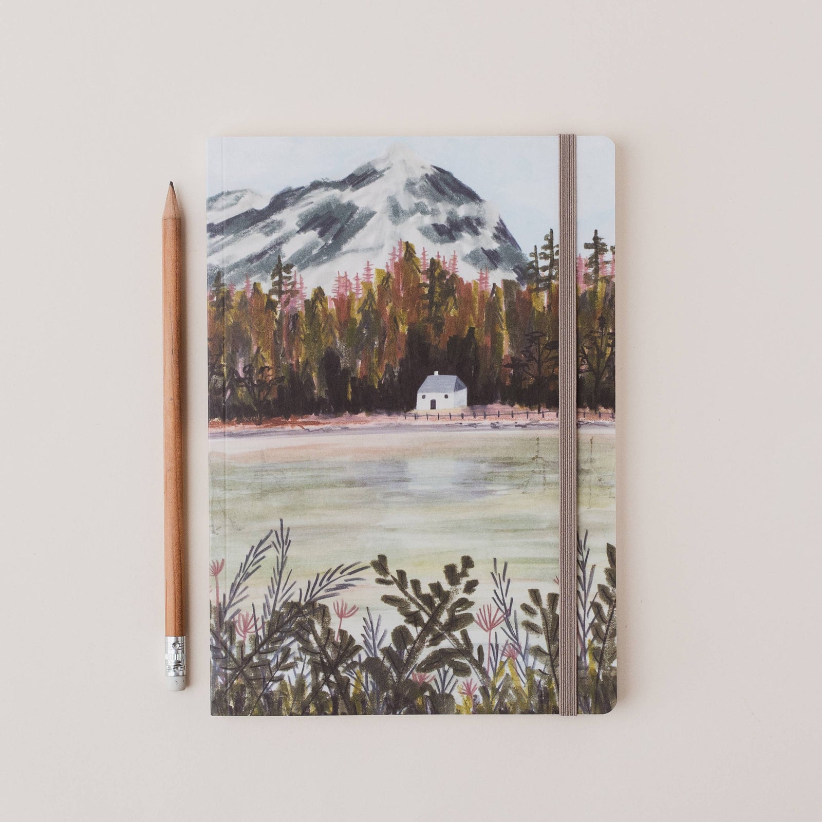 Loch Lomond A5 Scottish Ruled Notebook by penny black shown with pencil