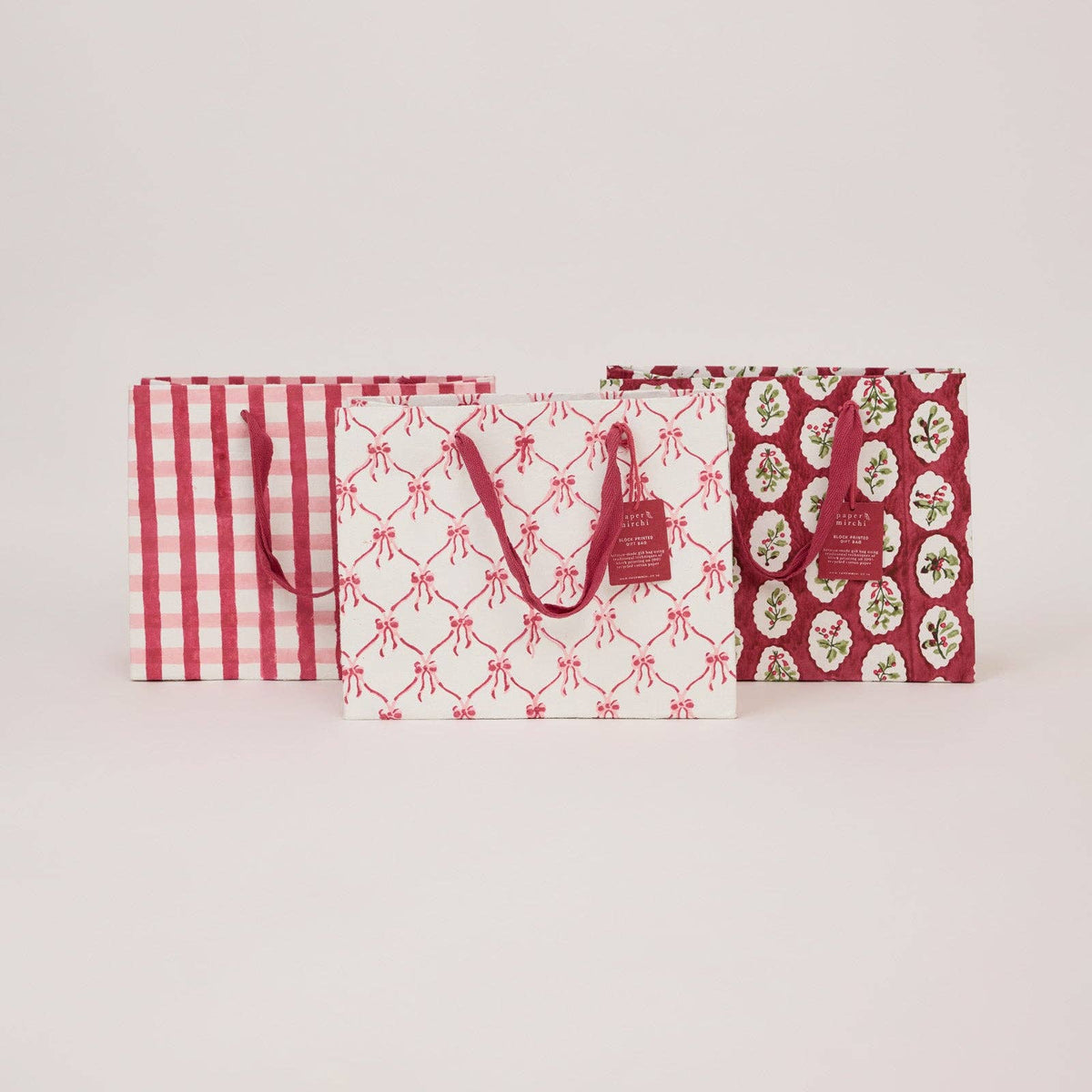 Three block printed gift bags by paper mirchi and penny black