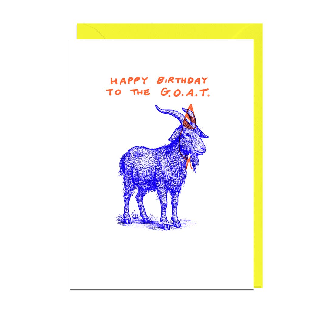 Greeting card with a blue goat illustration and 'Happy Birthday to the G.O.A.T.' text on a white background and yellow envelope.