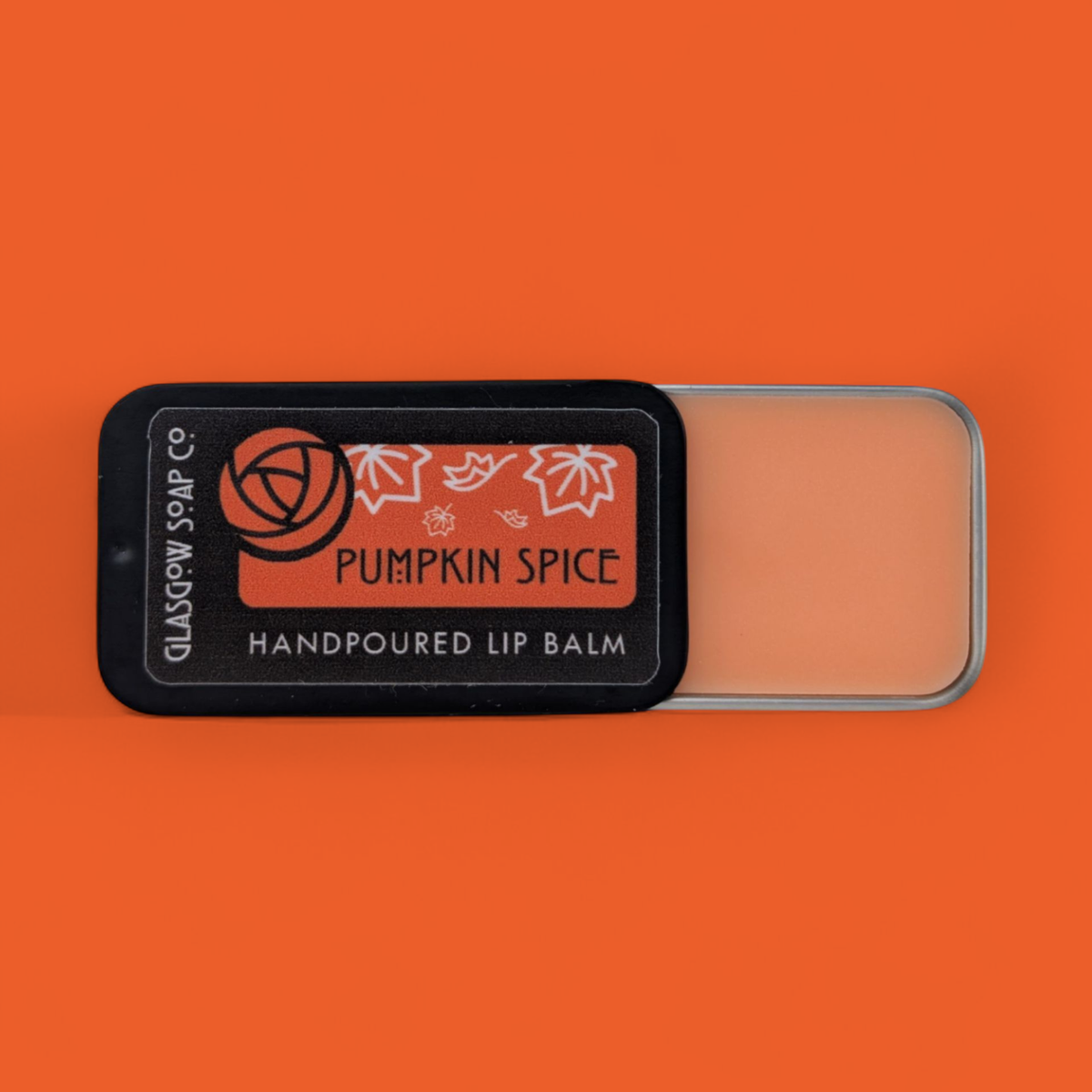 Pumpkin Spice Lip Balm Tin by glasgow soap company at penny black showing lip balm in tin