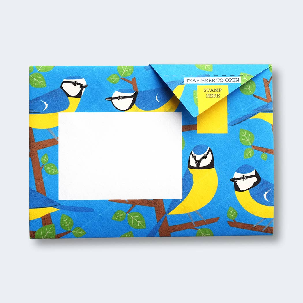 Dawn Chorus Pigeon Folding Letter Set by penny black showing a light blue folded letter with blue tits in a tree