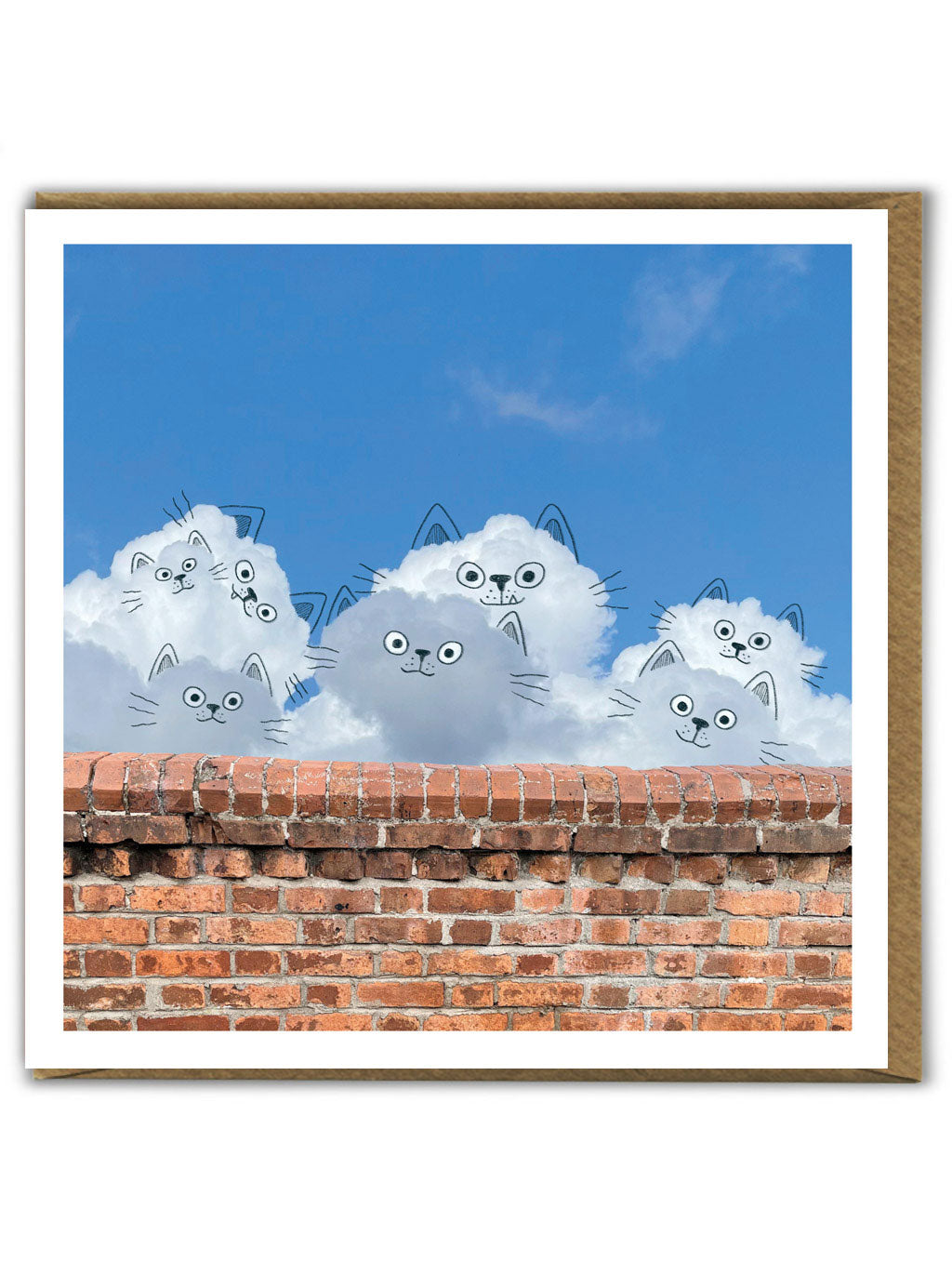 A greetings card showing a cloudy sky where the clouds have been made to look like lots of cats peering over a brick wall using a black pen.