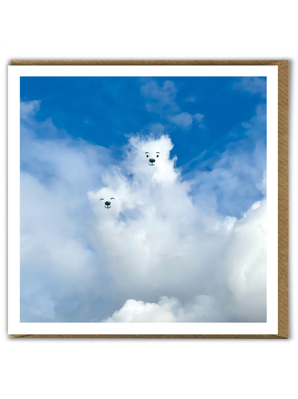 A greetings card showing a cloudy sky where the clouds have been made to look like two bear cubs using a black pen.