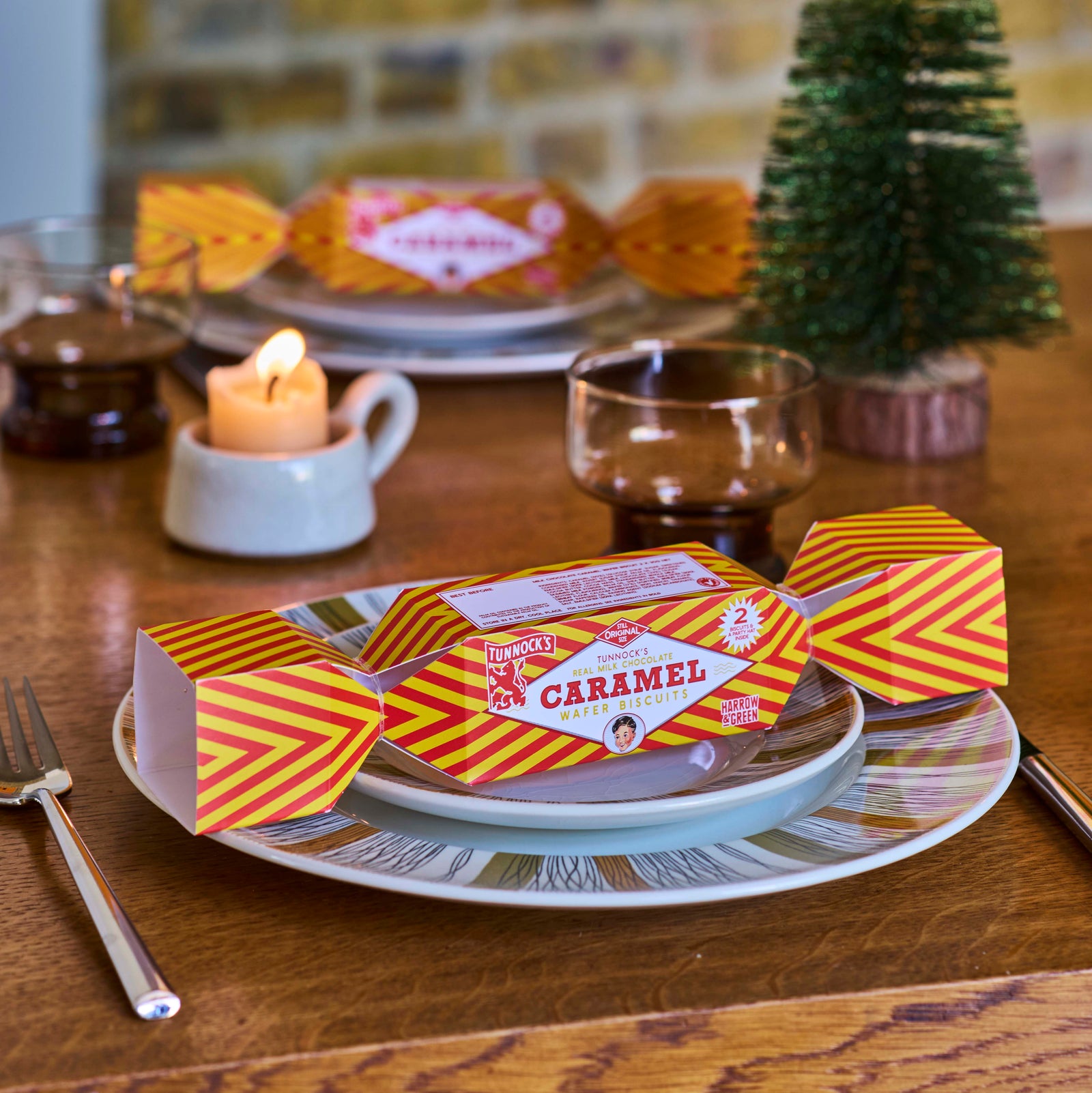 Tunnock's Caramel Wafer Biscuit Christmas Cracker by penny black - shown on a christmas table