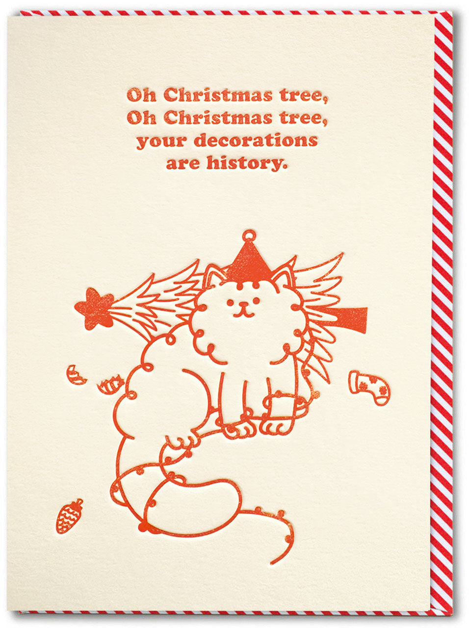 A cream-coloured greeting card with red-orange printed text and illustration of a cat wearing a Christmas hat and ornaments and the words 'oh Christmas tree, oh Christmas tree, your decorations are history' with red-and-white candy striped envelope behind.
