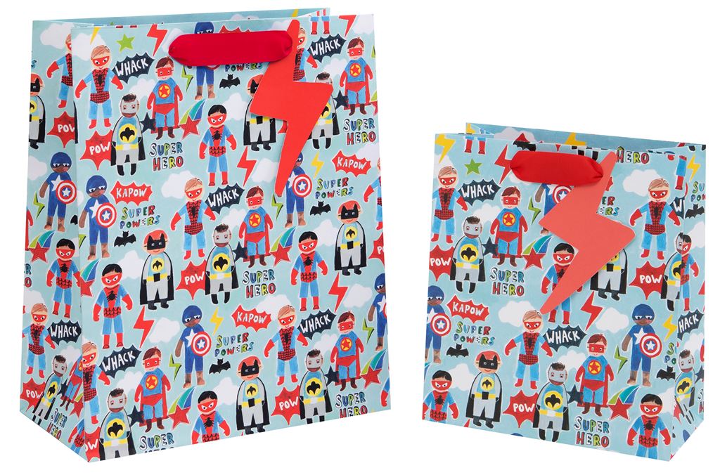 Two gift bags with a light blue background covered in superhero illustrations. Little boys are dressed as Captain America, Batman and Spiderman feature. There are also embellishments in the background of white clouds, red thunderbolts and phrases such as &#39;whack&#39;, &#39;pow&#39; and &#39;kapow&#39;. There is also a red ribbon handle with a red thunderbolt gift tag.