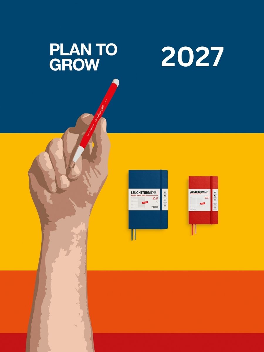 A graphic design for a 2027 LEUCHTTURM1917 planner or journal cover featuring the text 'PLAN TO GROW 2027' on a blue background, with a hand holding a red pen over yellow, orange, and red stripes. Two small notebooks, one blue and one red, labelled 'LEUCHTTURM1917 2027', are shown on the right.