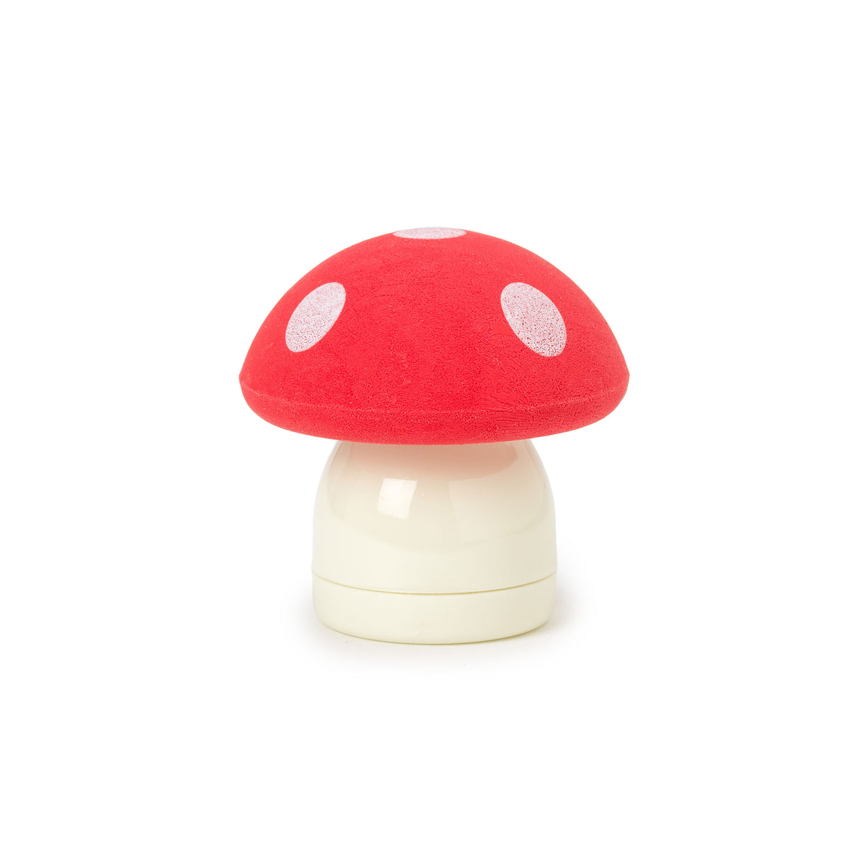 A toadstool eraser/sharpener in one. It has a cream colour stalk and a red and white spotted top.